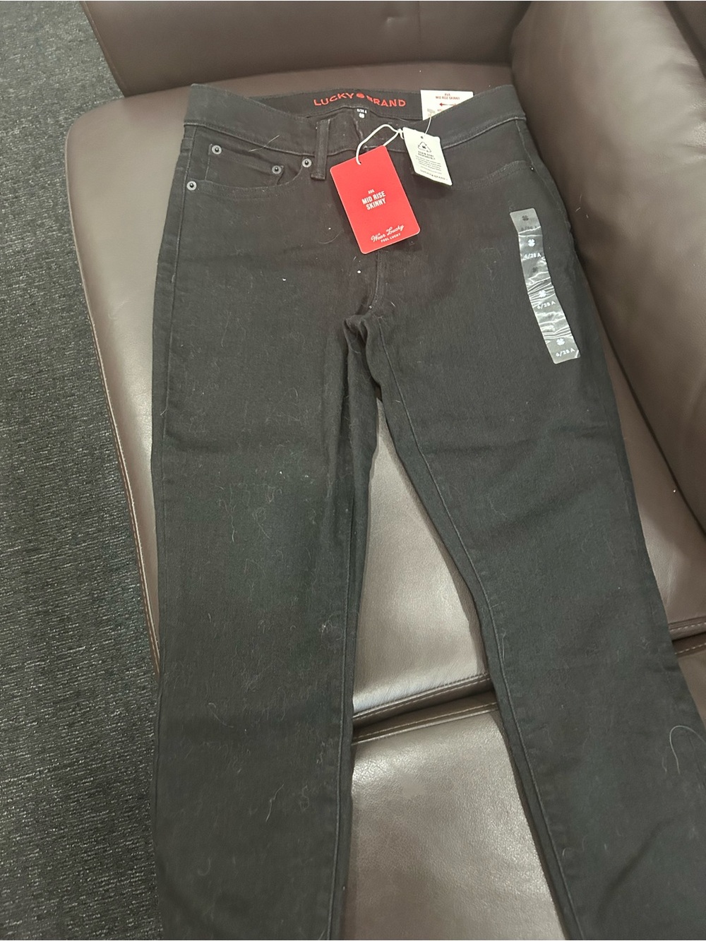 Lucky Brand Black Jeans with Red Logo Stitching. Available Skinny